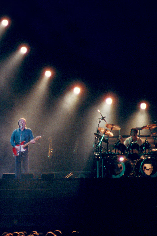 Pink Floyd performing live on a rainy night in Oakland, California